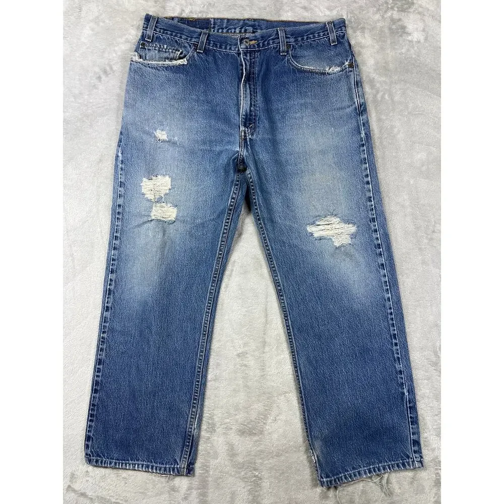 Vintage Levi's 550 Distressed Jeans 38x30 Made in USA Light Wash